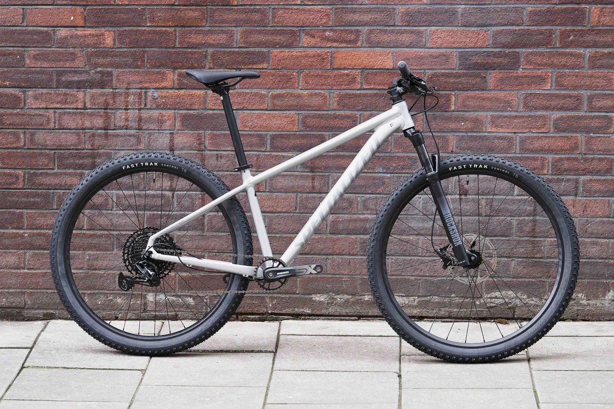 Specialized hardtail mountain bike against a wall