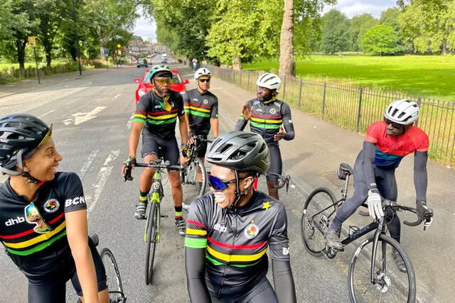 Group of riders from the Black Cyclists Network stopped on the roadside