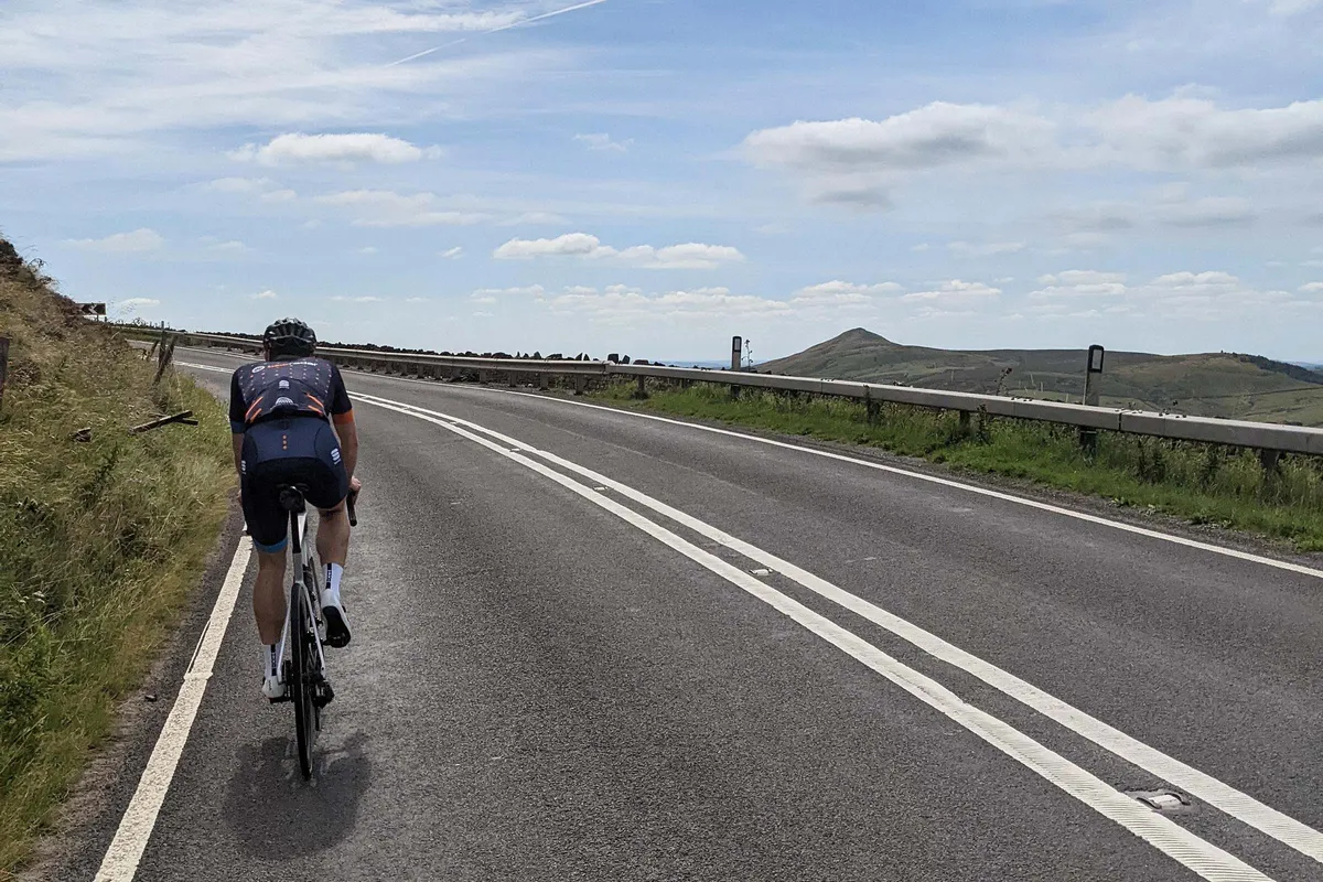 Stan Portus riding up Cat and Fiddle in the Peak District.
