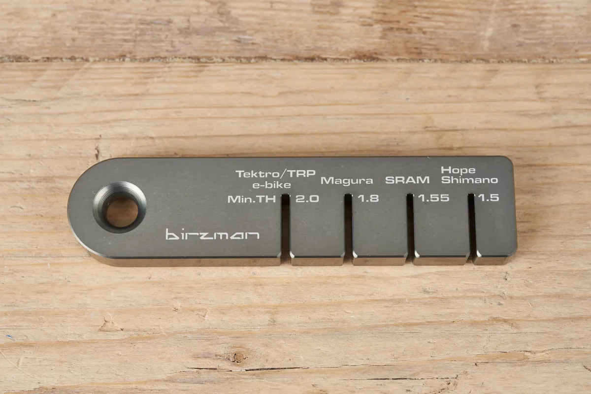 Birzman brake tools on a wooden background