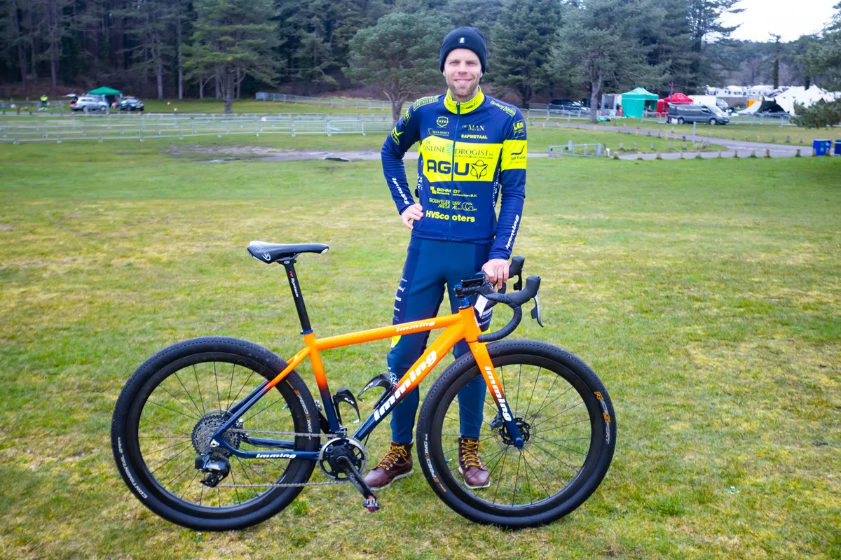 Richard Jansen posing with Imming beach racing bike