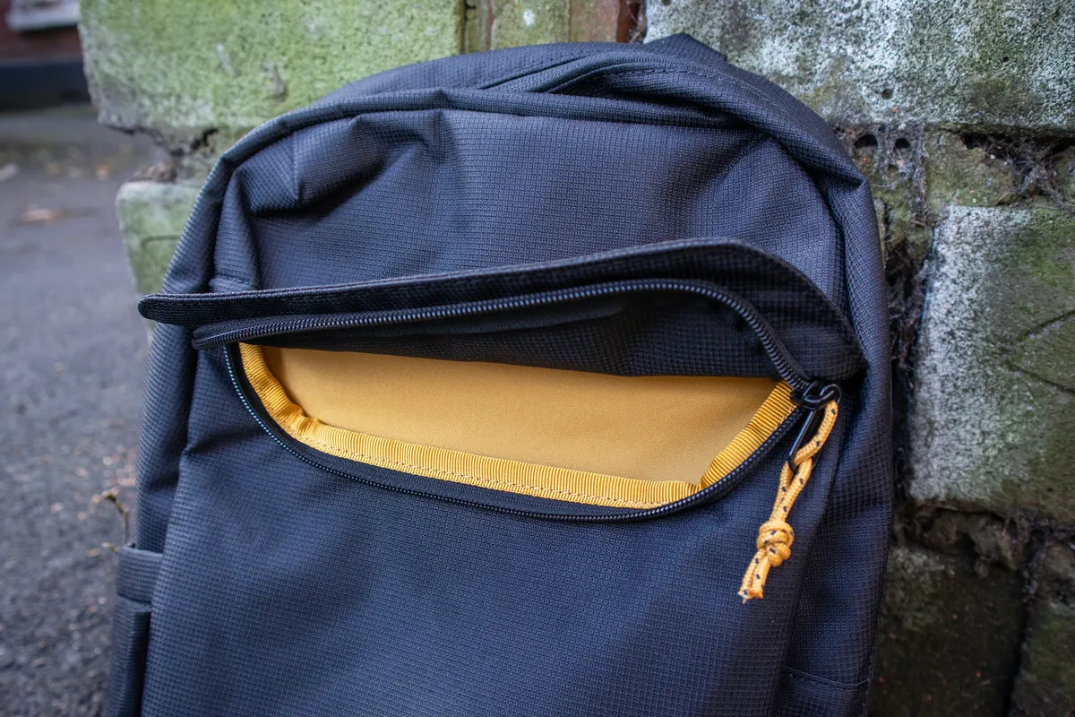 Chrome Ruckas backpack front pocket unzipped.