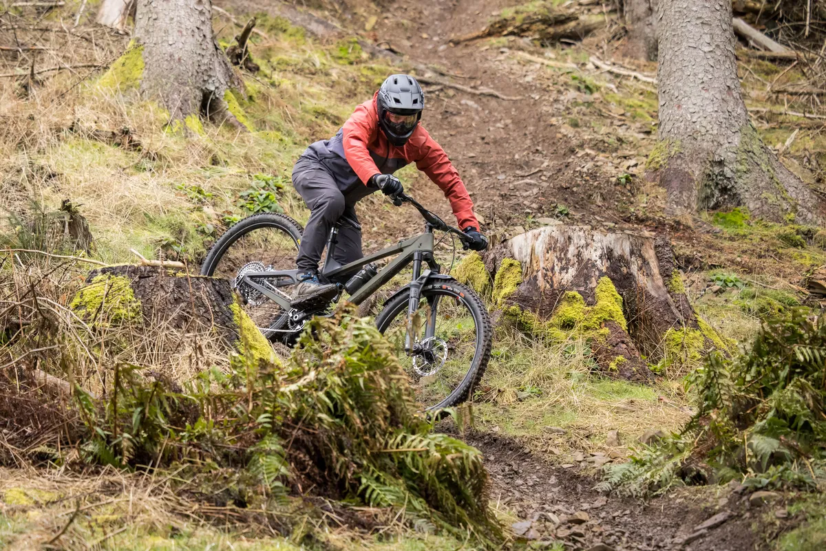 Male mountain biker Alex Evans riding a We Are One Arrival 152 enduro mountain bike fitted with SRAM's XX T-Type Eagle Transmission Powermeter AXS groupset