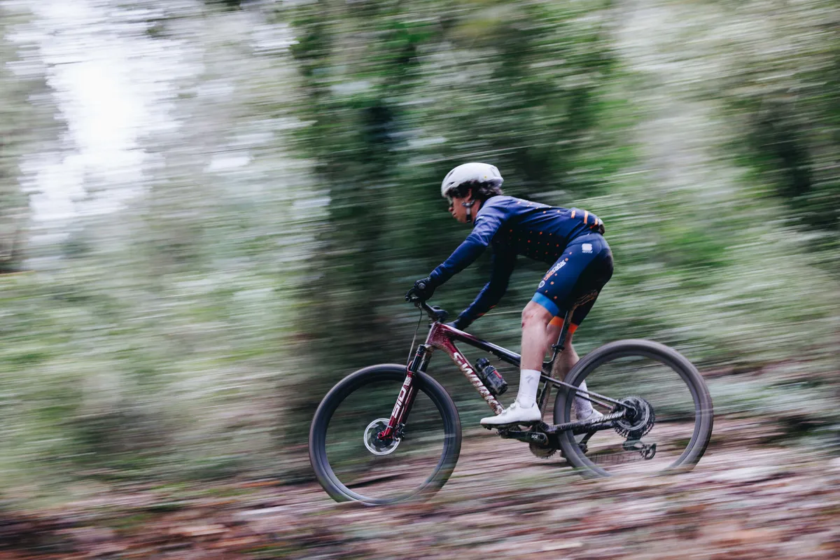 Specialized Epic World Cup riding shot pan through woodland