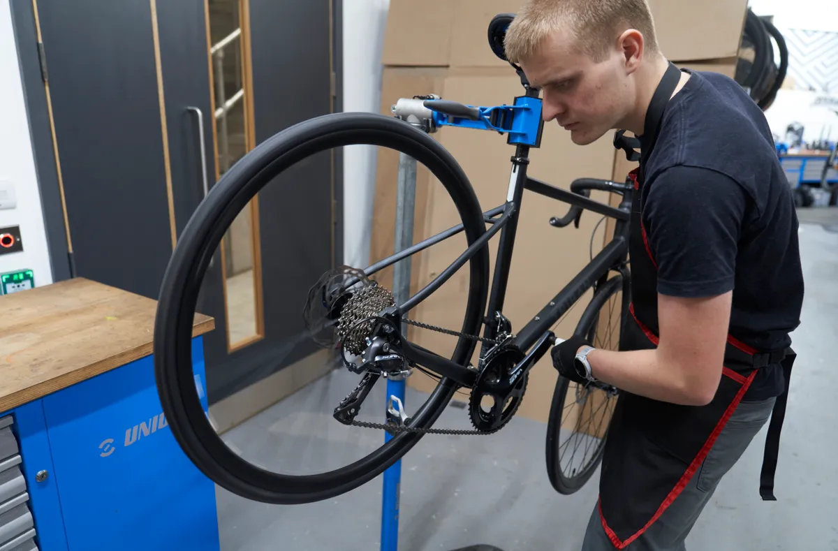 Oscar Huckle adjusting and indexing gears on Triban bike
