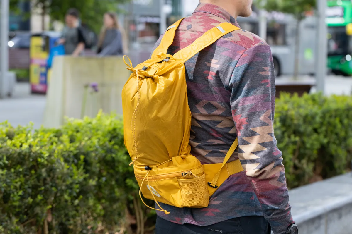 Oscar Huckle wearing Specialized x Fjällräven Expandable Hip Pack converted as a backpack