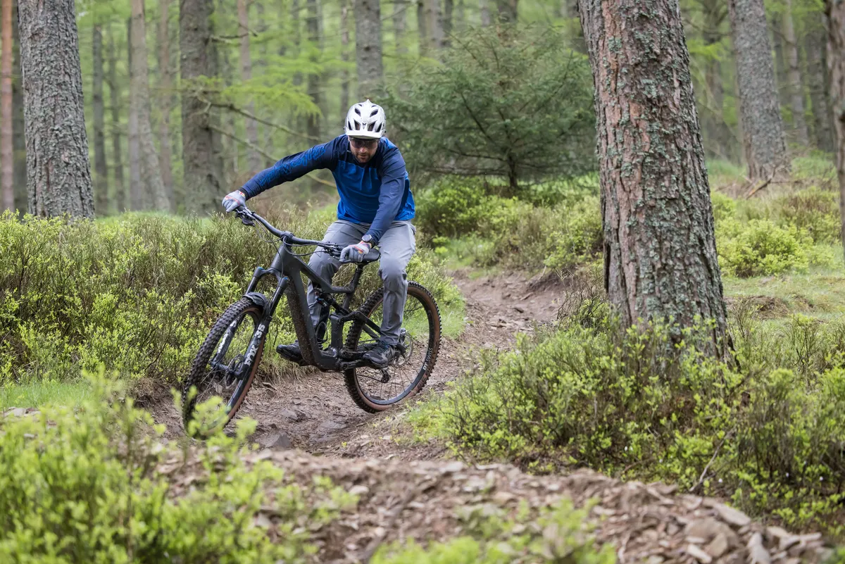 Focus Jam2 SL 9.9 lightweight electric mountain bike ridden by male mountain bike Alex Evans on the Angry Sheep trail in Innerliethen, Scotland