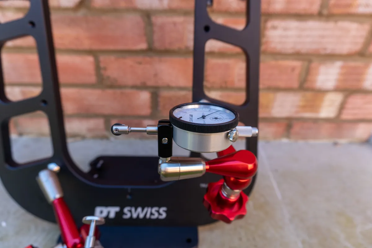 DT Swiss Wheel Truing Stand against a wall