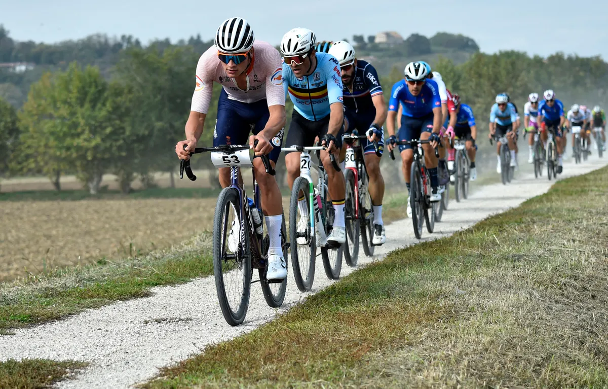 Dutch rider Mathieu Van Der Poel rides ahead of Belgian rider Greg Van Avermaet during the first edition of the UCI Gravel World Championships 2022 between Vicenza and Cittadella.