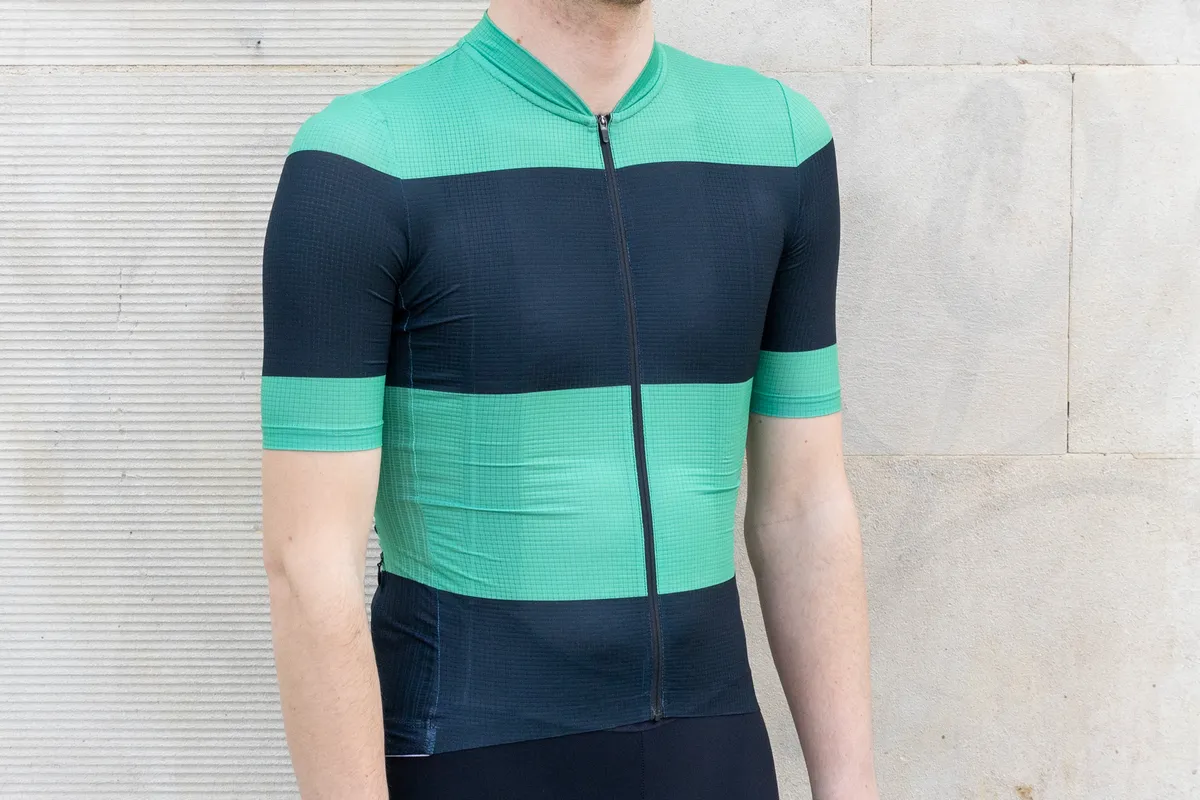 Café du Cycliste Angeline jersey in green and black.