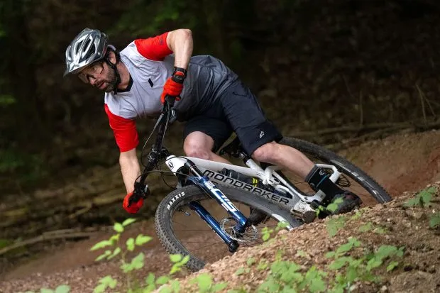 Male rider testing the 2024 RockShox SID Ultimate 3P fork (with TwistLoc remote)