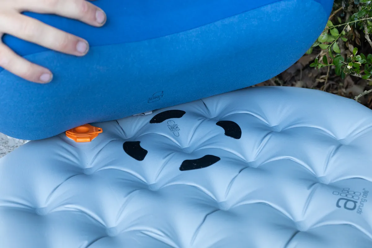 The pillow can attach to the mat via the 'Pillow Lock' system.