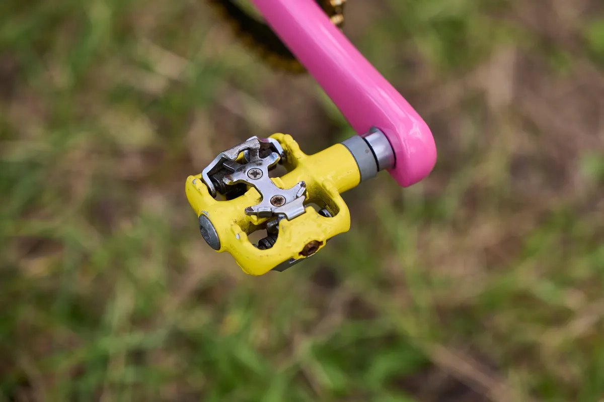 Yellow Shimano SPD pedals on the Fat Chance Buck Shaver at the 2023 Malverns Classic Mountain Bike Festival