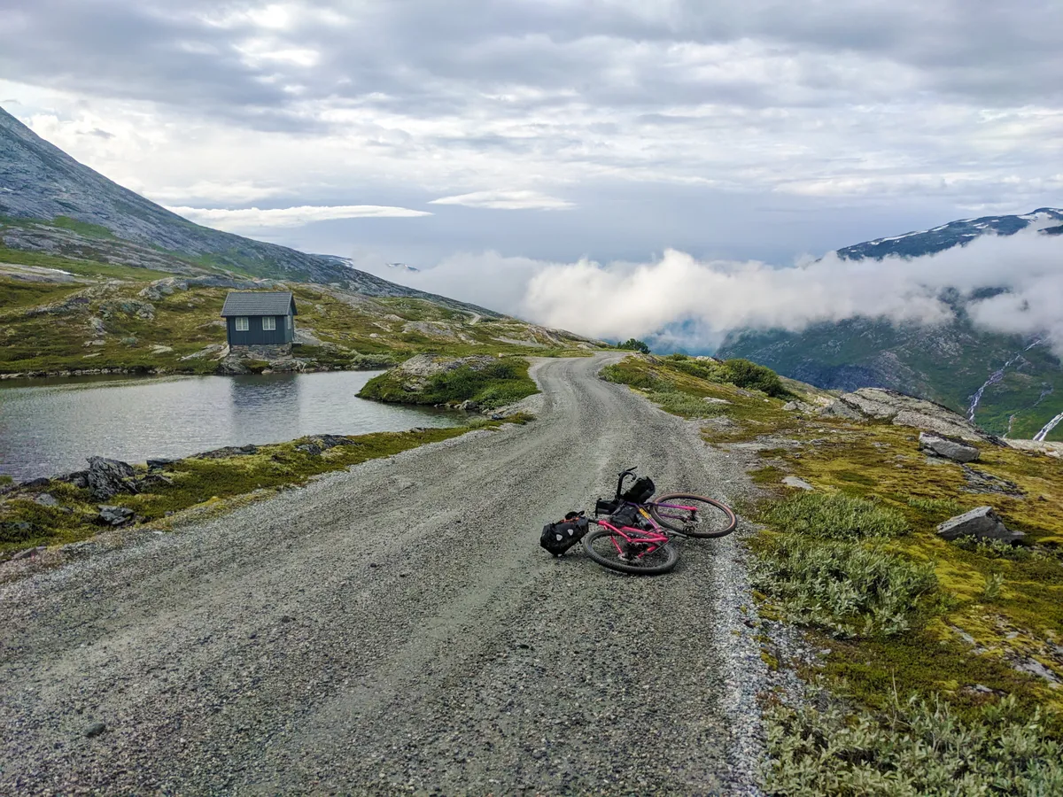 Bike laid down on gravel path in Norway