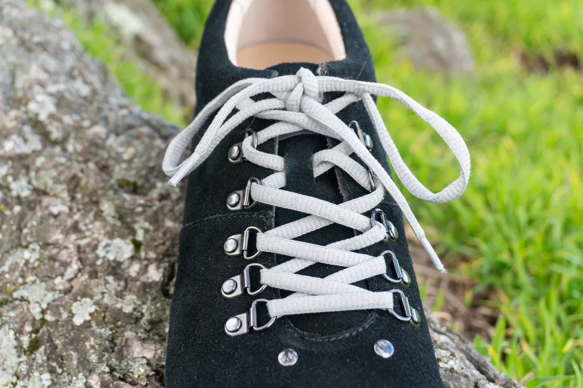 Stomp Lox Slack shoes on a tree branch