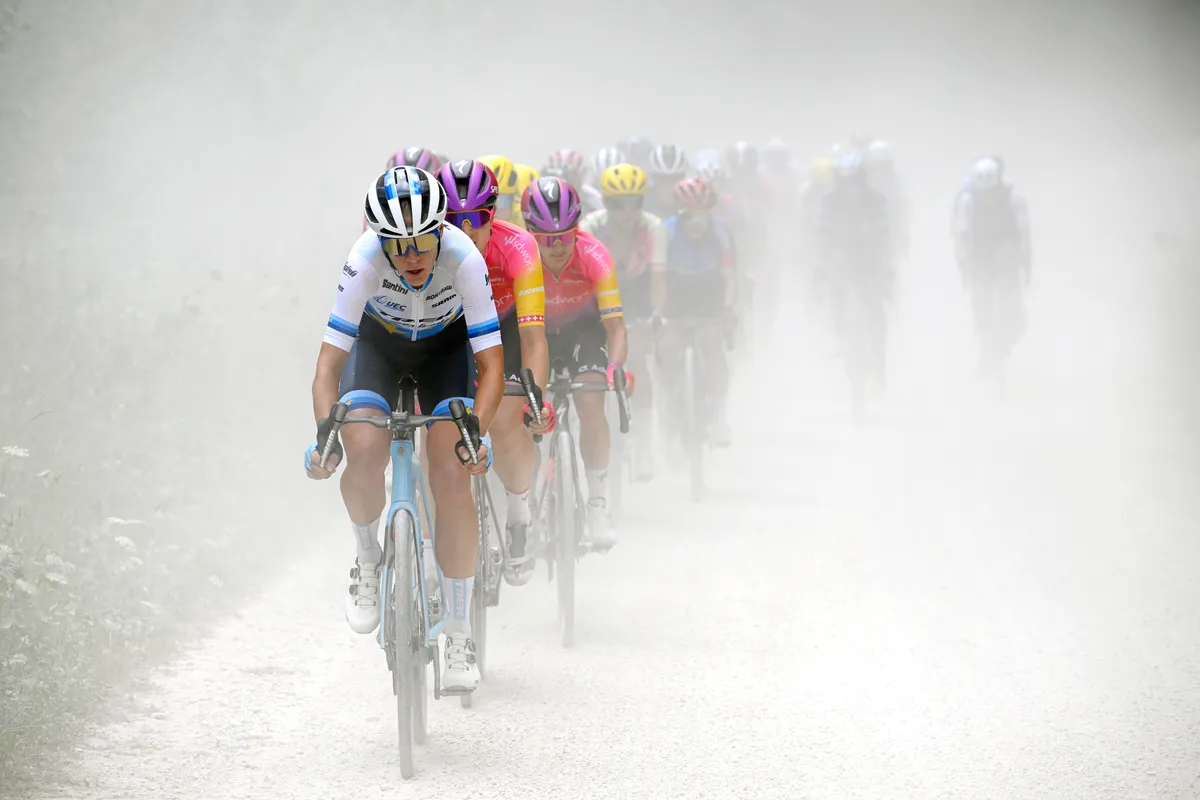 BAR-SUR-AUBE, FRANCE - JULY 27: (L-R) Ellen Van Dijk of Netherlands and Team Trek- Segafredo and Marlen Reusser of Switzerland and Team SD Worx lead the peloton through a gravel road sector during the 1st Tour de France Femmes 2022, Stage 4 a 126,8km stage from Troyes to Bar-Sur-Aube / #TDFF / #UCIWWT / on July 27, 2022 in Bar-sur-Aube, France. (Photo by Bernard Papon - Pool/Getty Images)