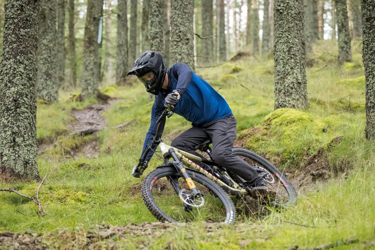 DT Swiss FR 1500 Classic mountain bike wheels fitted to a Marin Alpine Trail XR enduro mountain bike ridden by male mountain bike tester Alex Evans on a trail called Angry Sheep in Scotland's Tweed Valley.