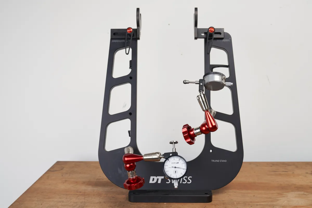 DT Swiss Wheel Truing Stand on a desk