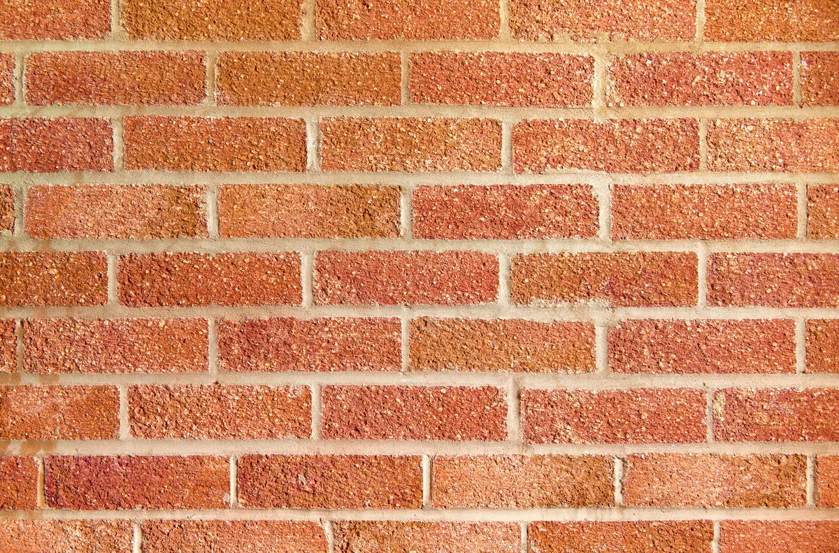 red brick wall showing regular pattern