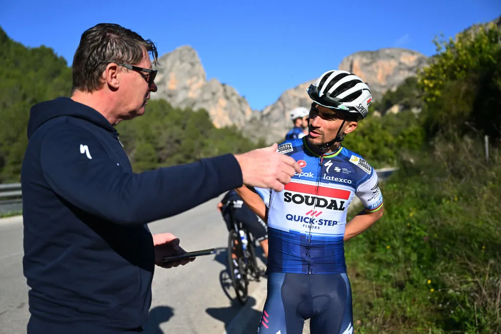 ALTEA, SPAIN - JANUARY 12: Julian Alaphilippe of France (R) talks with a staff member during the Team Soudal Quick-Step - Training Camp on January 12, 2023 in Altea, Spain. (Photo by Luc Claessen/Getty Images)