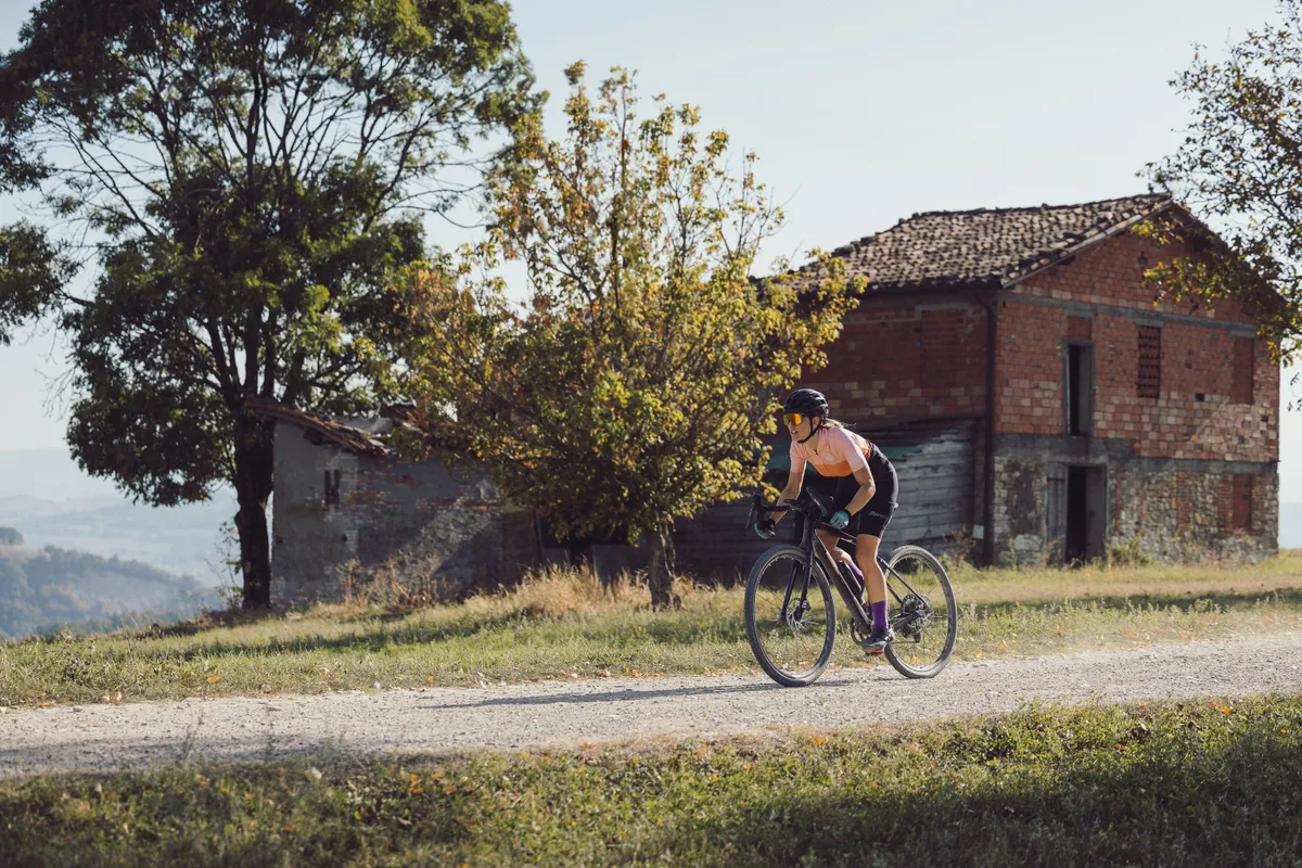 Woman riding Merida Silex gravel bike