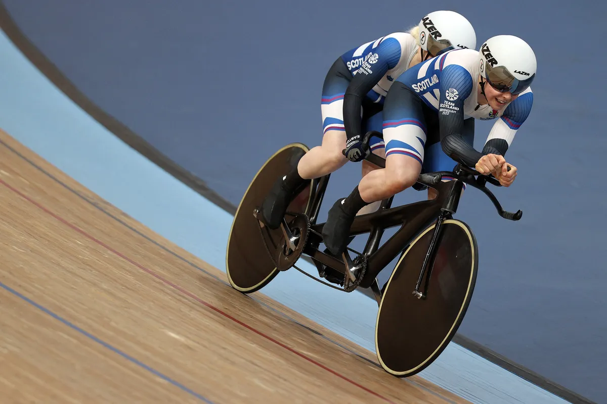 Paralympian Aileen McGlynn (left) riding a tandem with pilot Ellie Stone at the 2022 Commonwealth Games.