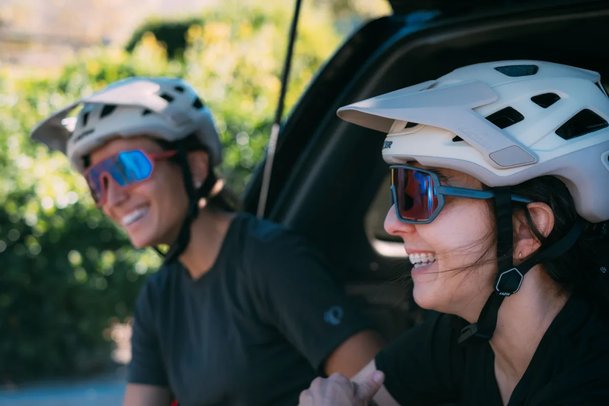 Female mountain bikers wearing Shimano Technium sunglasses