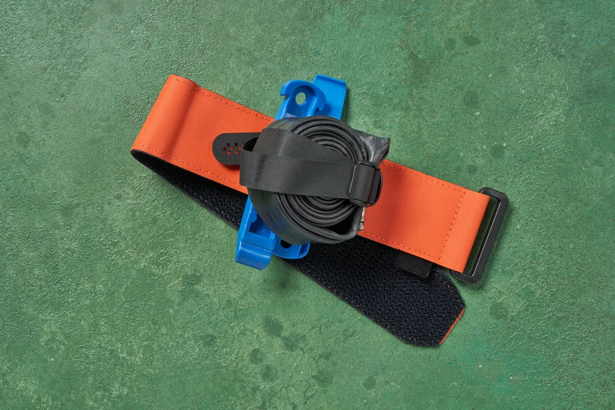 Restrap Frame strap holding inner tube and tyre levers