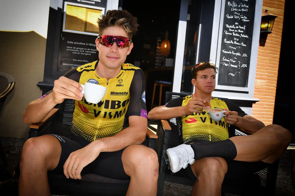 Belgian Wout Van Aert of Team Jumbo-Visma drinks a cup of coffee after a training session
