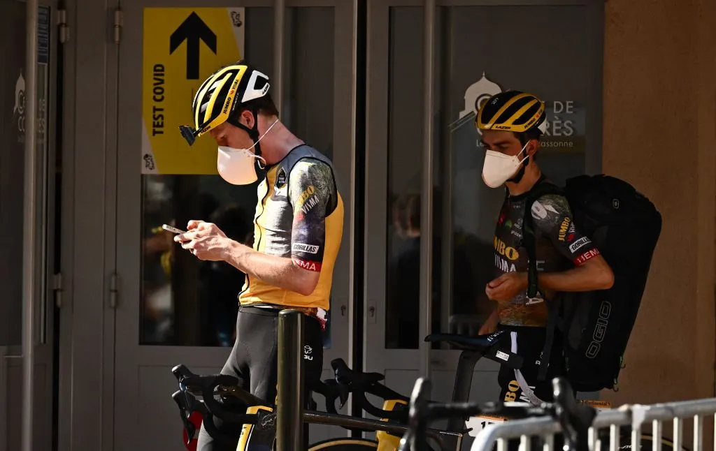 Jumbo-Visma team's Belgian rider Nathan Van Hooydonck (L) waits for a mandatory Covid-19 test after competing in the 15th stage of the 109th edition of the Tour de France cycling race, 202,5 km between Rodez and Carcassonne in southern France, on July 17, 2022. (Photo by Marco BERTORELLO / AFP) (Photo by MARCO BERTORELLO/AFP via Getty Images)