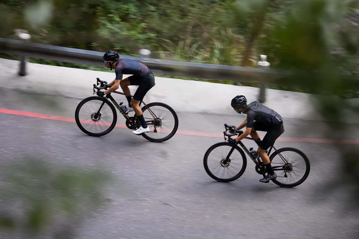 Two cyclists riding the MY25 TCR Advanced SL 0