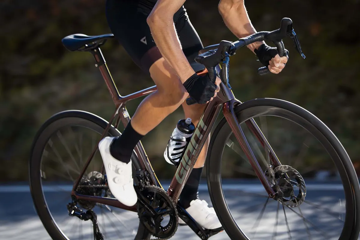 Male cyclist riding the MY25 TCR Advanced SL 0