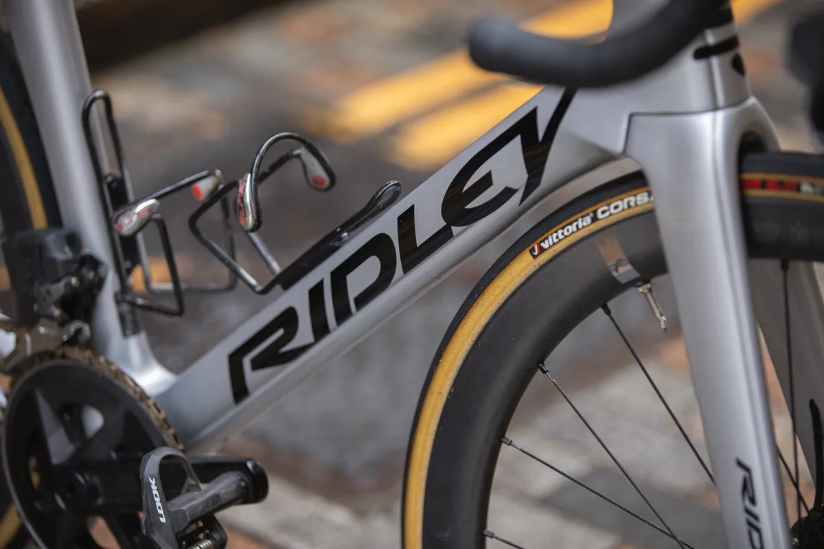 Close-up of Ridley logo on down tube of Ridley Noah Disc Essential road bike.