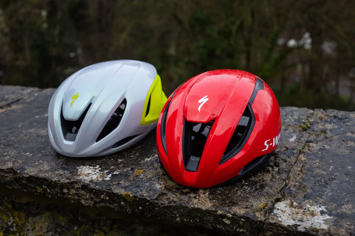 Specialized Propero 4 and S-Works Evade 3 helmets side-by-side. 