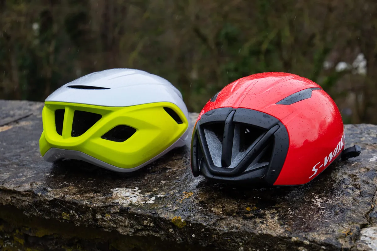 Specialized Propero 4 and S-Works Evade 3 helmets side-by-side. 