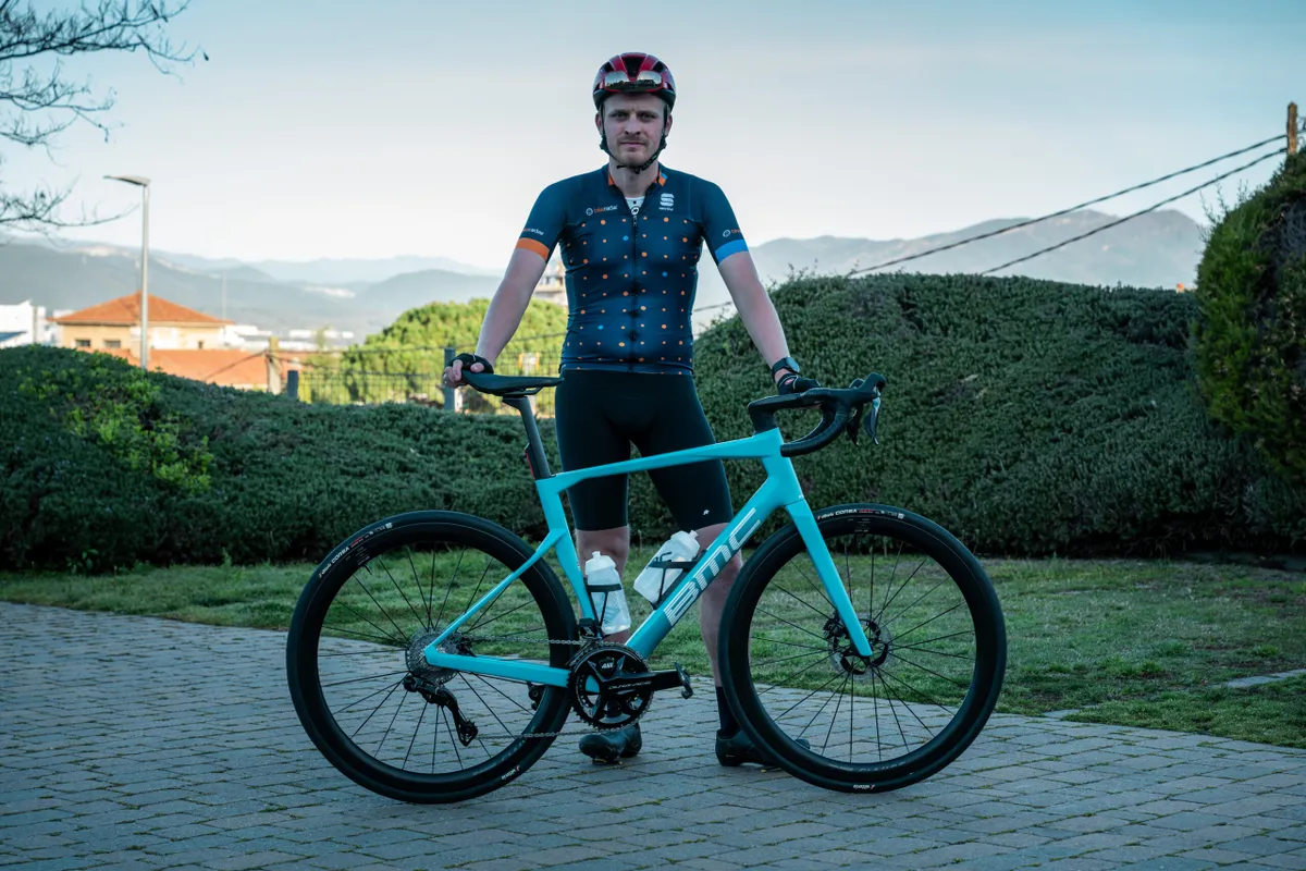 Oscar Huckle standing with BMC Roadmachine 01 Two