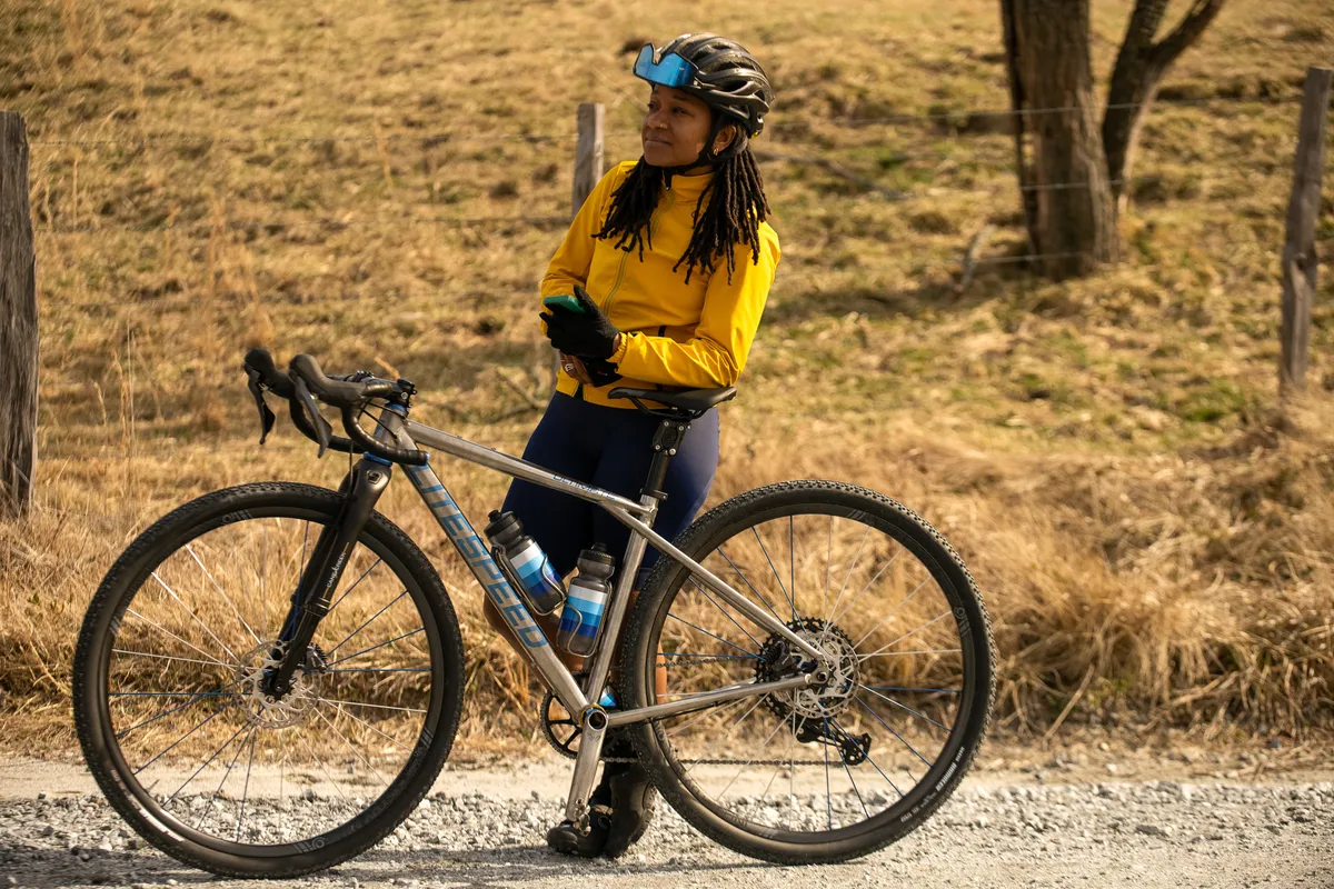 Female cyclist with Litespeed gravel bikes with Cane Creek Invert fork 