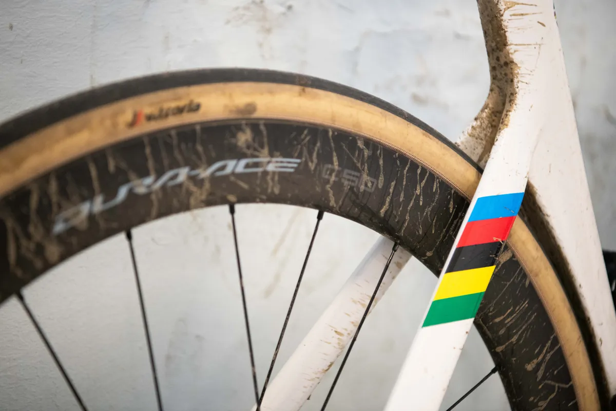 Mathieu van der Poel's 2024 Paris-Roubaix Canyon Aeroad rear wheel covered in mud.