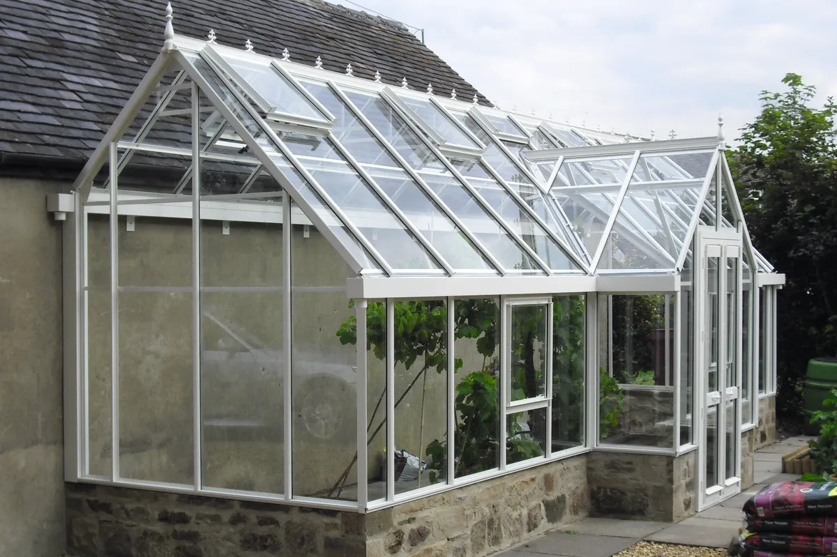 Dovetail greenhouse with dormer porch, best greenhouses with porches, best Victorian greenhouse