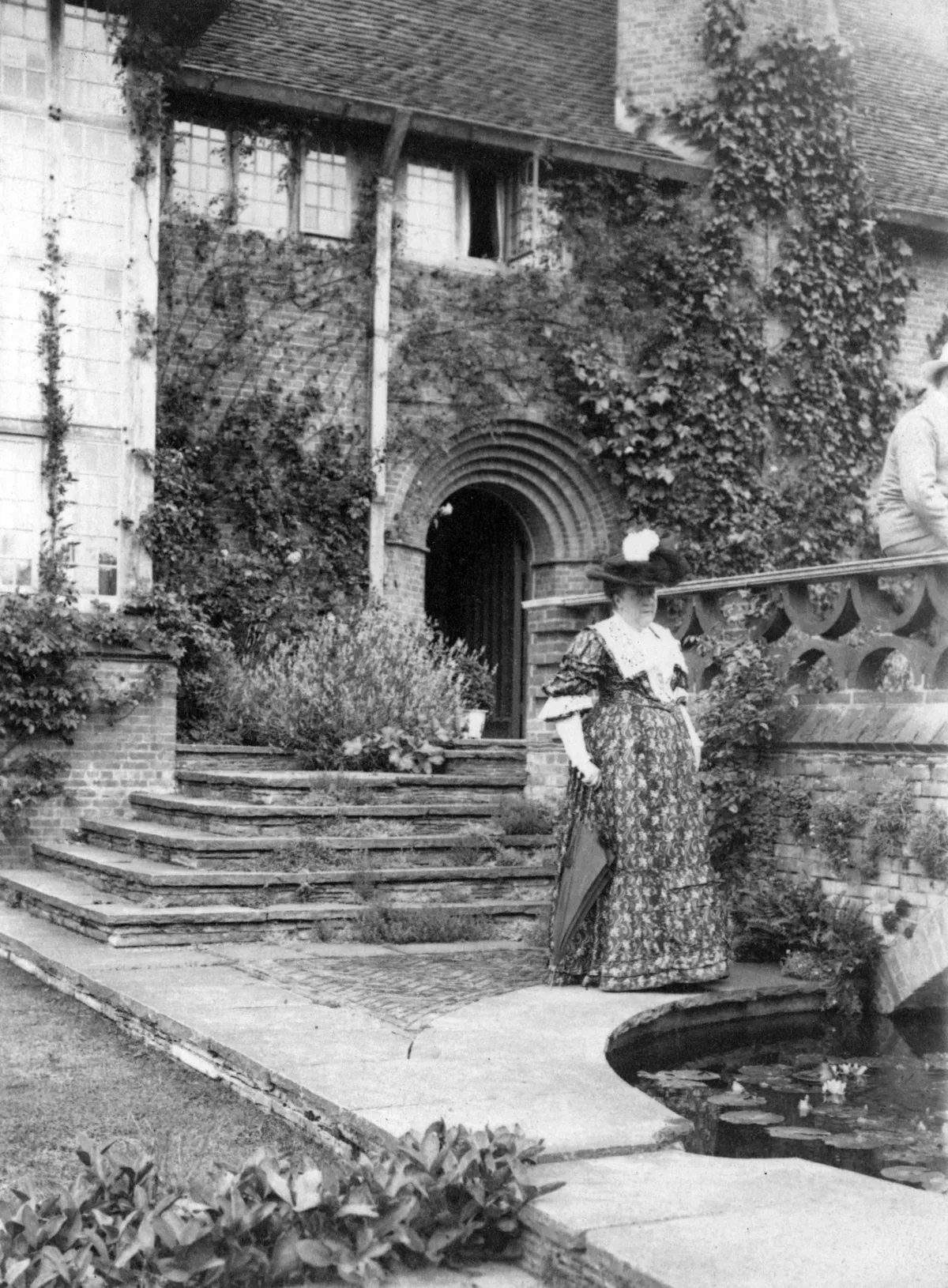 Gertrude Jekyll beside the terrace bridge at Deanery Garden, Sonning, Berkshire, after 1901. Sir Edwin Lutyens built the house for Edward Hudson