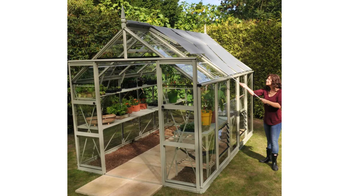 Harrod Superior Greenhouse Cool Sage with woman in garden