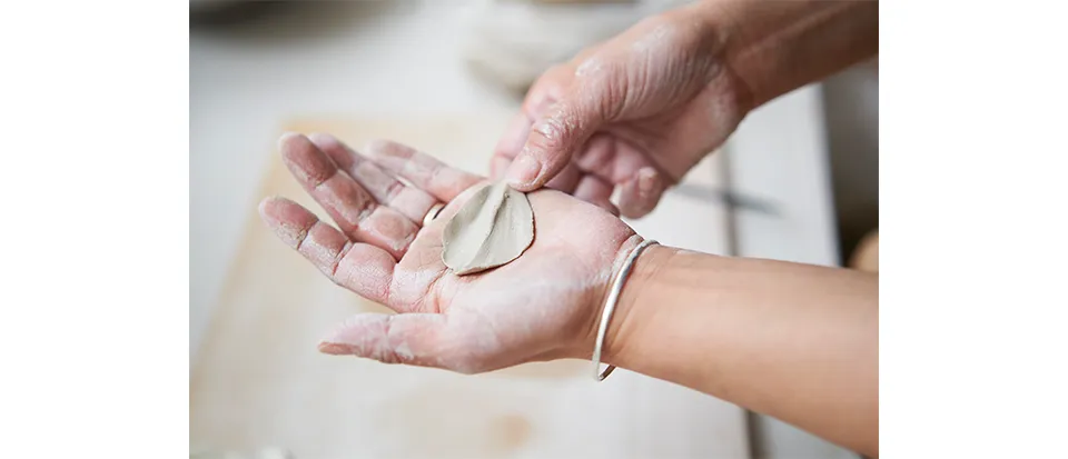 Kaori works with stoneware clay, preferring its texture and warmth to that of porcelain, which she finds too stark