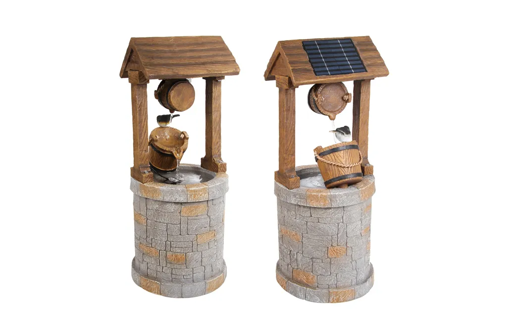Solar powered wishing well water feature on white background