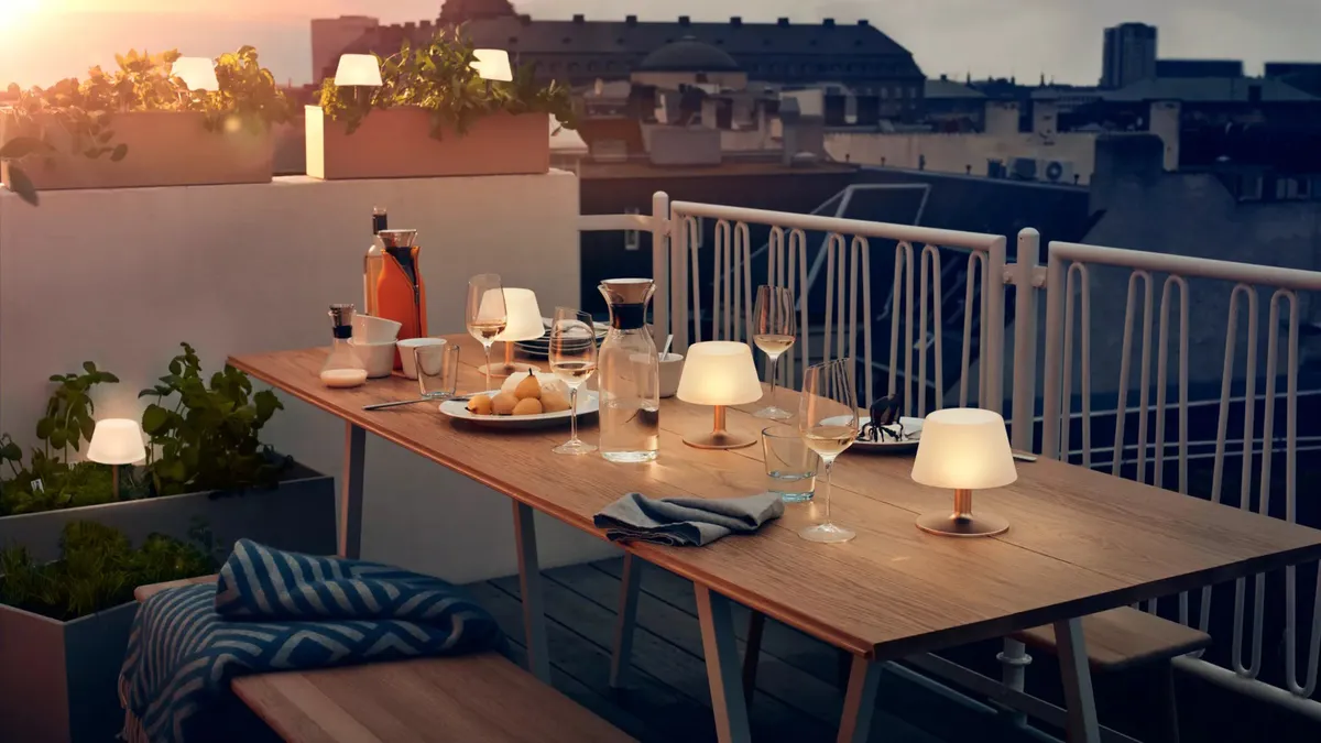 Eva Solo SunLight Solar Outdoor Lamp on an outdoor dining table