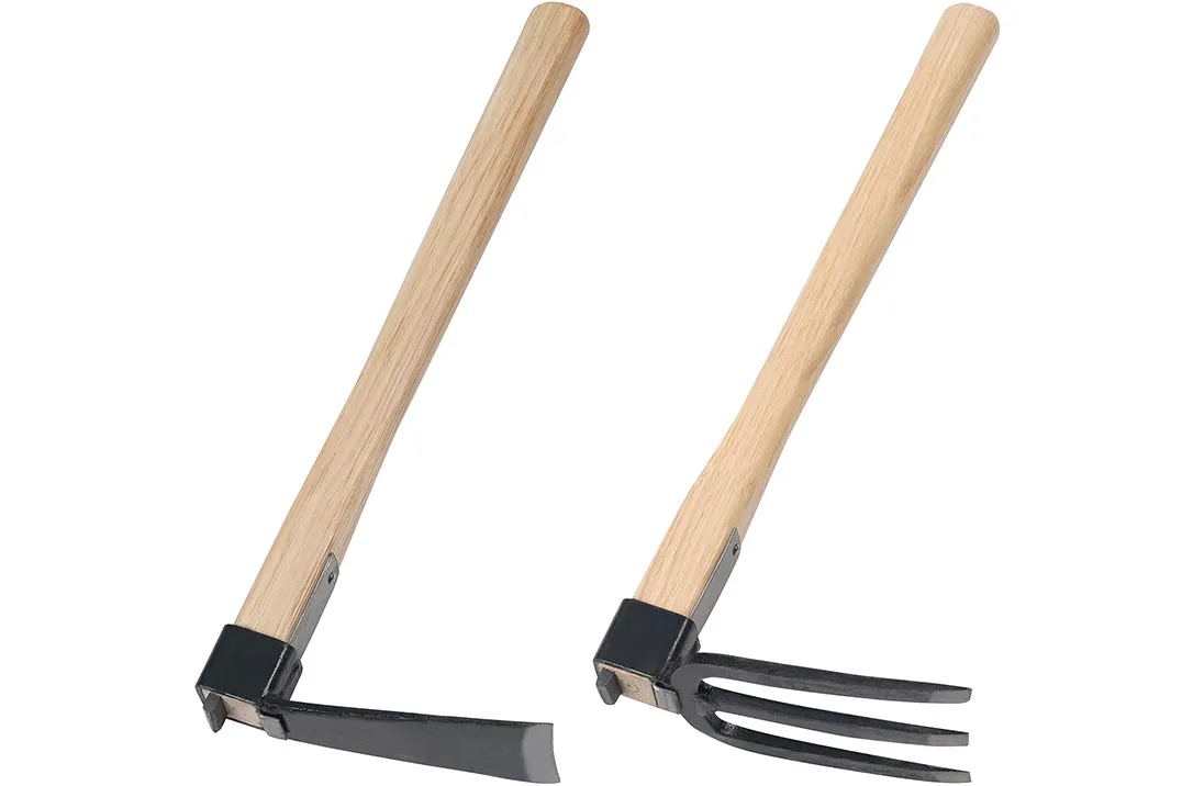 Niwaki hand hoe and fork on a white background