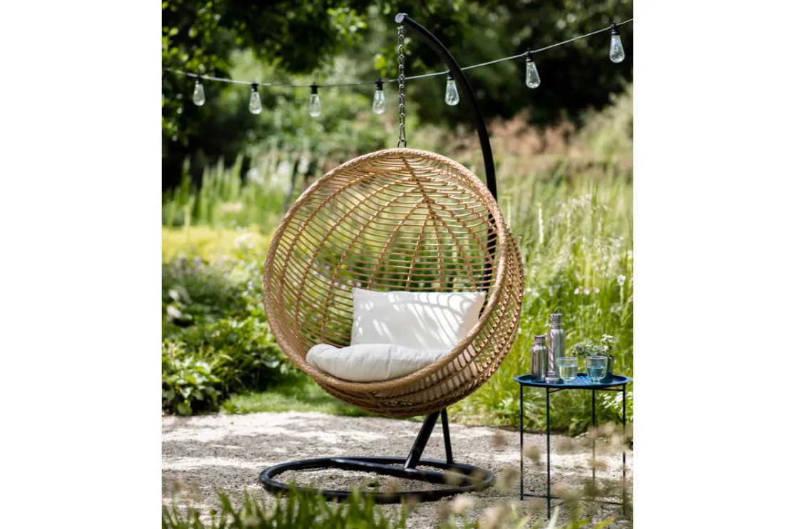 Hanging nest chair with cream cushion