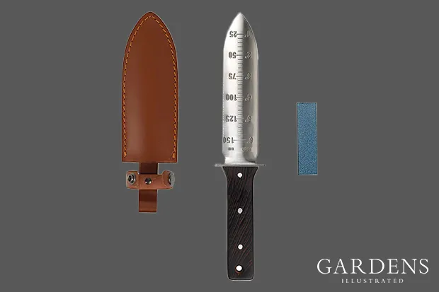 Flora Guard Professional Hori Hori Garden Knife, sheath and sharpening stone on a grey background