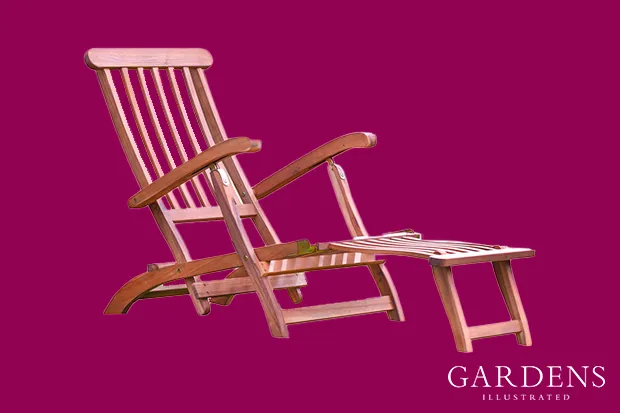 Plant Theatre Reclining Hardwood Steamer Chair on a pink background