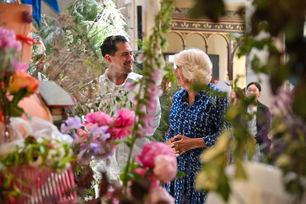 Her Majesty meets Antony Burger, founder of Mahal Kita Flowers, photo by Graham Lacdao