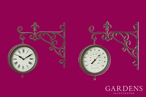 Marylebone Station Wall Clock & Thermometer on a pink background